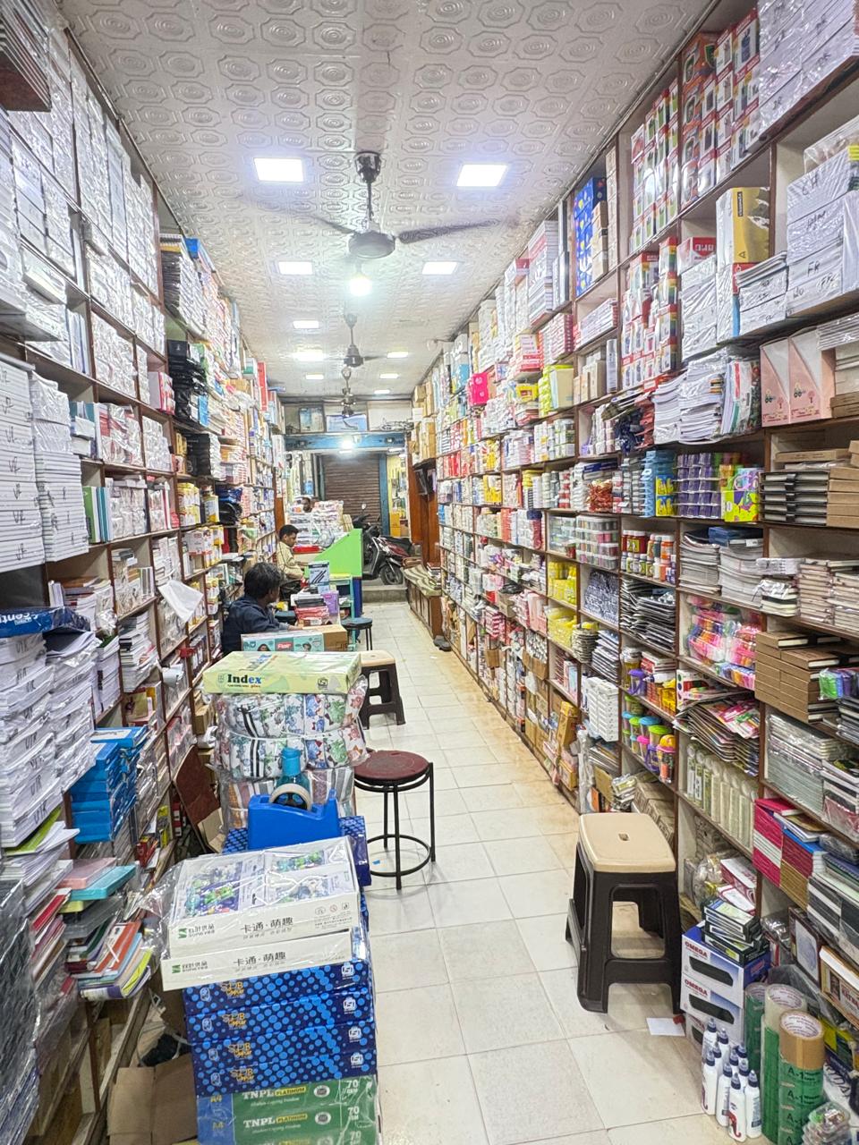Stationery products displayed along the NSA Stationers shop aisle